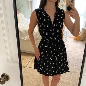 Divided black dress with white birds